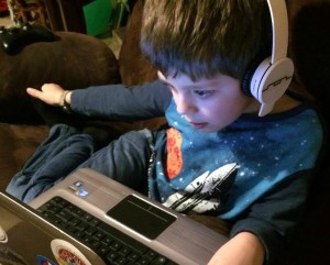 Listening to the audio while looking at the study guide.