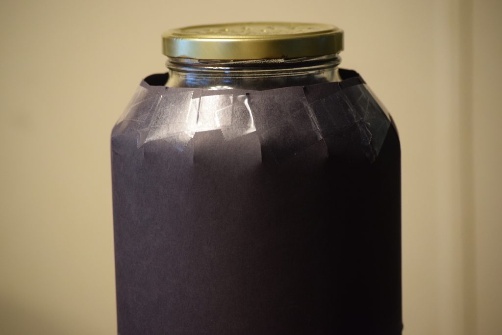construction paper over jar